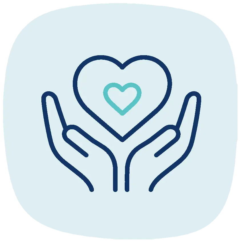 TraumaSolutions Outline of two hands holding a heart with a smaller heart inside, set against a light blue background—symbolizing how we are wired for connection.